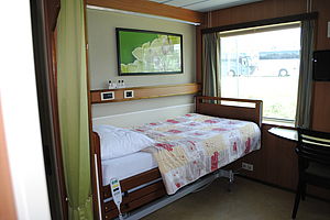 Eine Kabine mit Pflegebett